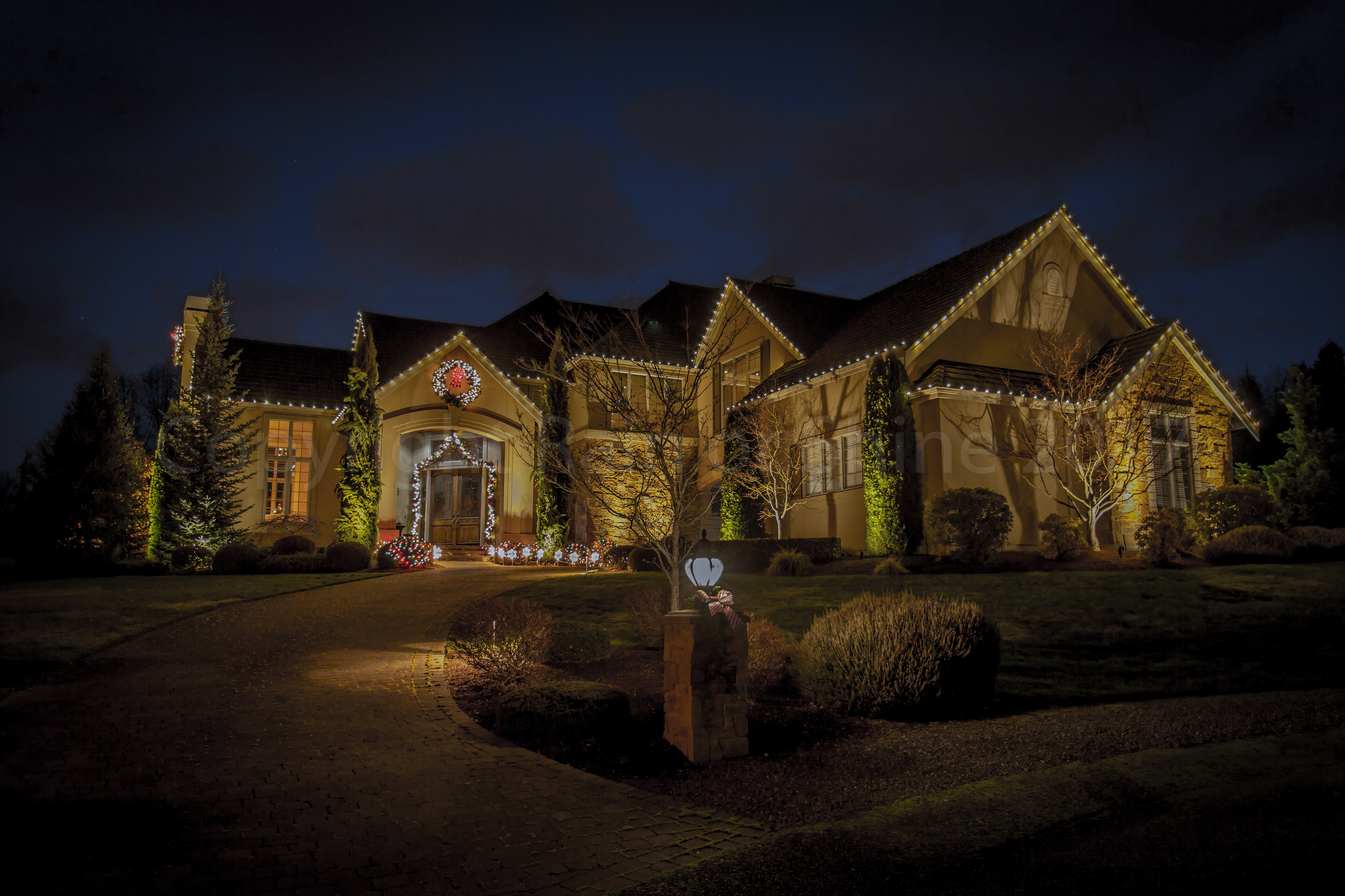Holiday lights on a house.